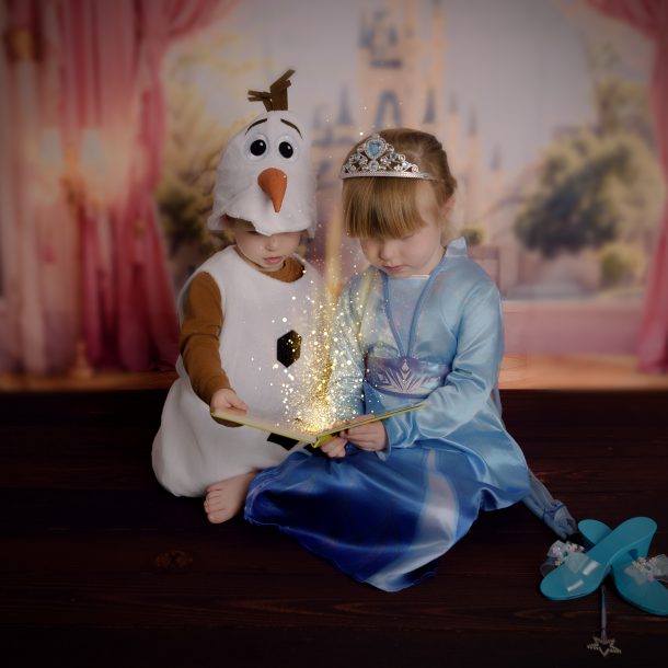 little girl and boy dressed as Elsa and Olaf rom frozen for princess photoshoot